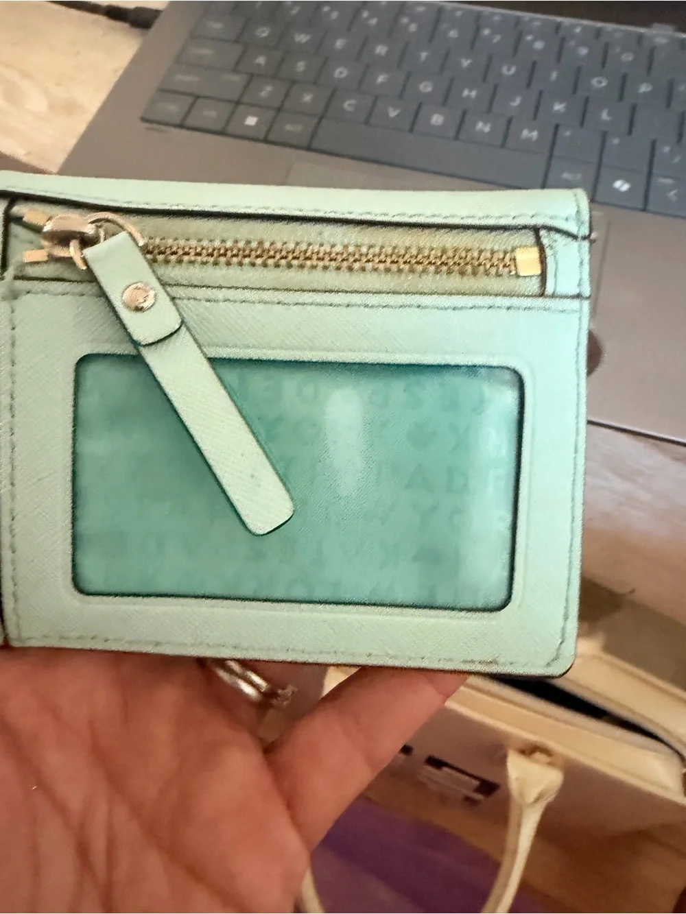 kate spade light mint leather compact wallet with gold logo plaque